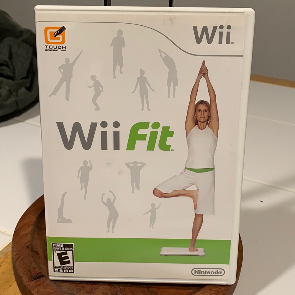Wii fit game comes with manual and disc